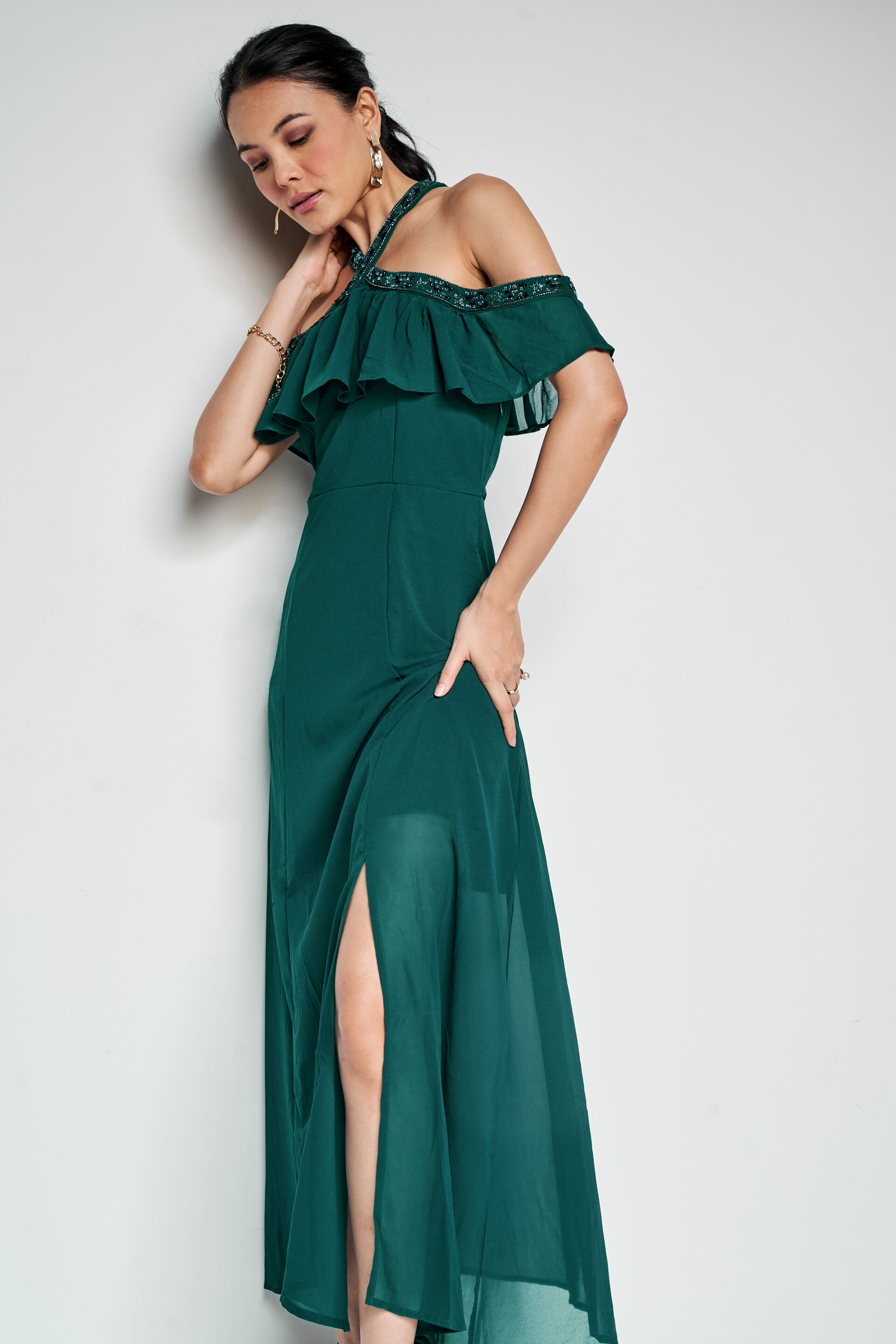 Buy our Emrald Green Solid Flared Gown online from ANDIndia SC